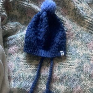 The North Face blue Knit tassel hat
